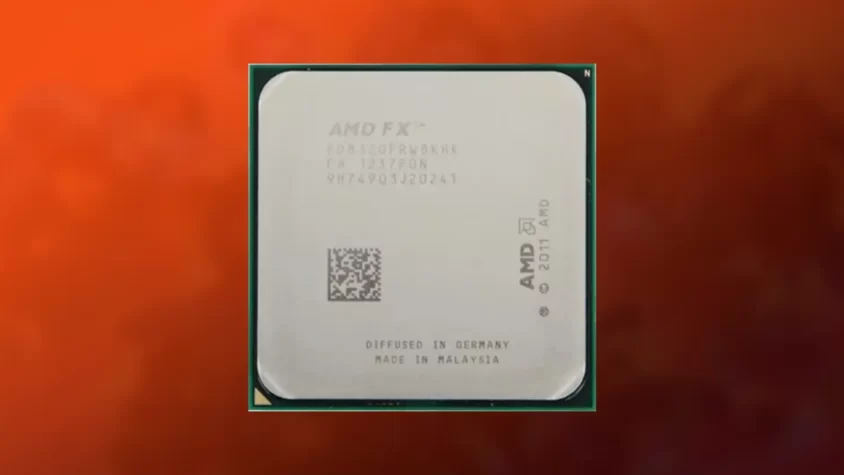 Процессор AMD FX-6100 на фоне красного оттенка.
