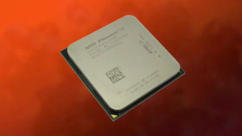 Процессор AMD Phenom II X2 550 на оранжевом фоне