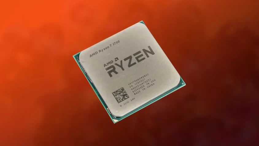 Процессор AMD Ryzen 7 1700 на фоне оранжевого оттенка.