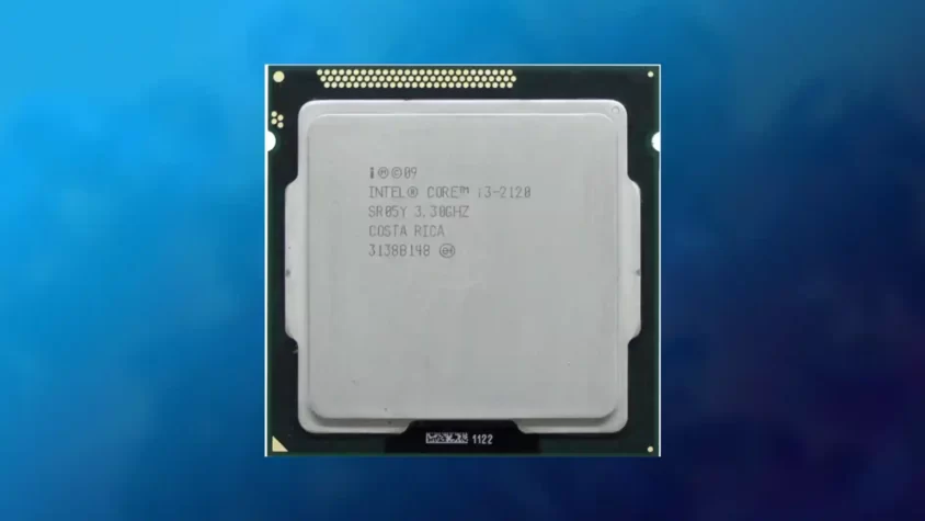 Процессор Intel Core i3-2120 на фоне компьютерных компонентов