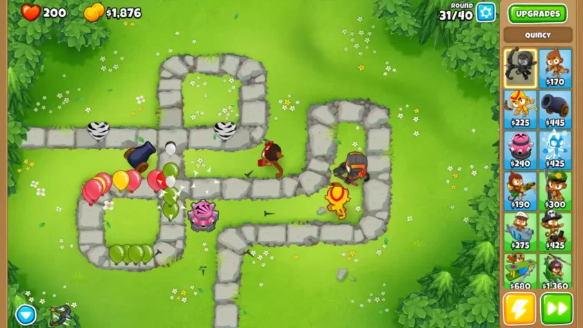 Скриншот игры Bloons TD 6: уровень с каноничными монками