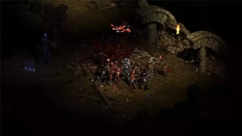 Скриншот Diablo II с сражением против многочисленных врагов в разрушенной локации