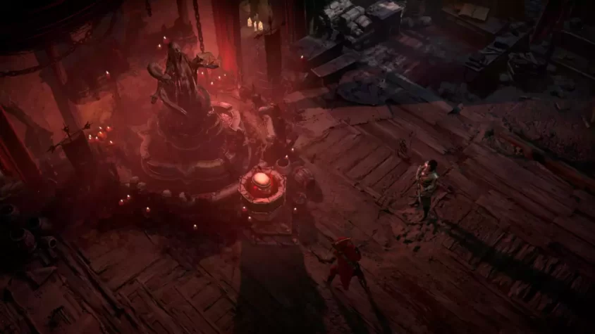 Скриншот из Diablo IV с каким-то странным алтарём и массовыми жертвами