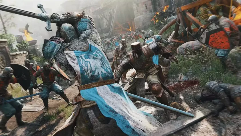Скриншот из игры FOR HONOR, бой рыцаря с несколькими врагами в окружении разрушений