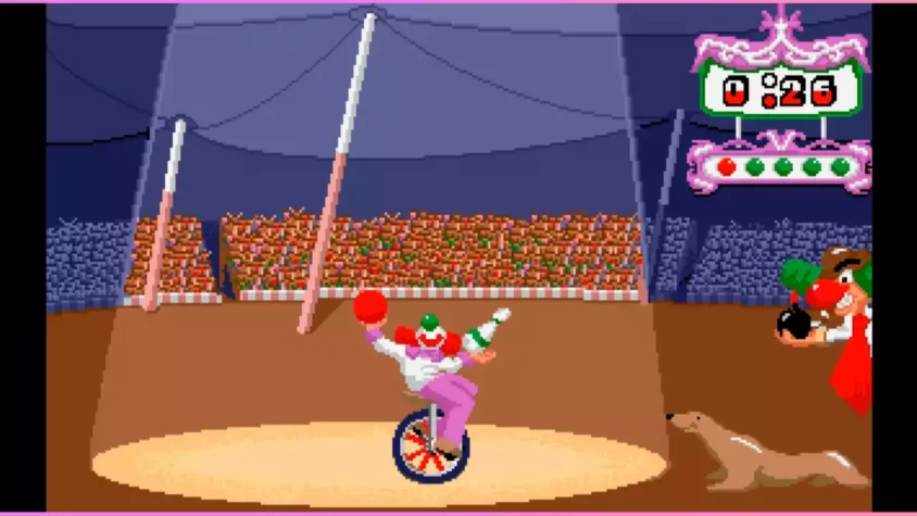 Клоун на велосипеде в Freddys Big Top o’ Fun