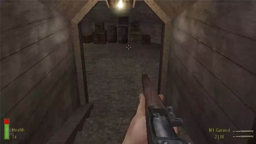 Скриншот из Medal of Honor Allied Assault — туннель с оружием в руках