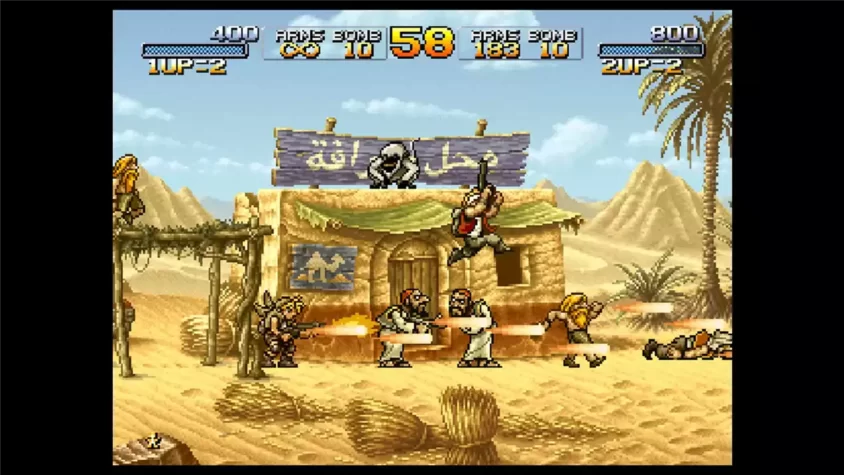 Скриншот Metal Slug 2, сцена с поездами и дракой на крыше