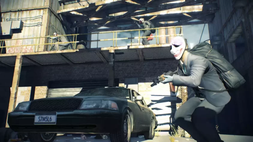 Персонаж с оружием в PAYDAY 2 на заднем плане разрушенной местности
