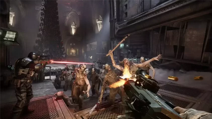 Персонажи сражаются в темном коридоре Warhammer 40,000: Darktide