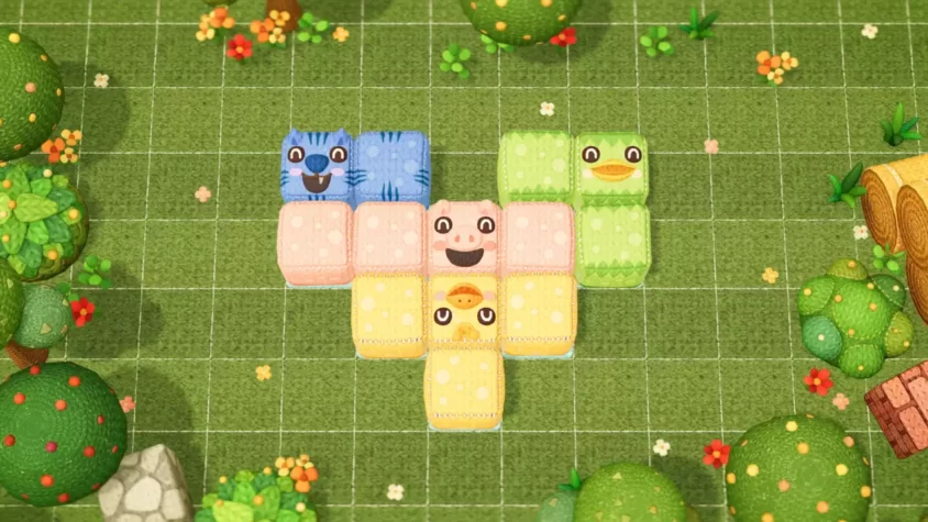 Персонажи игры, играющие в футбол на коврике