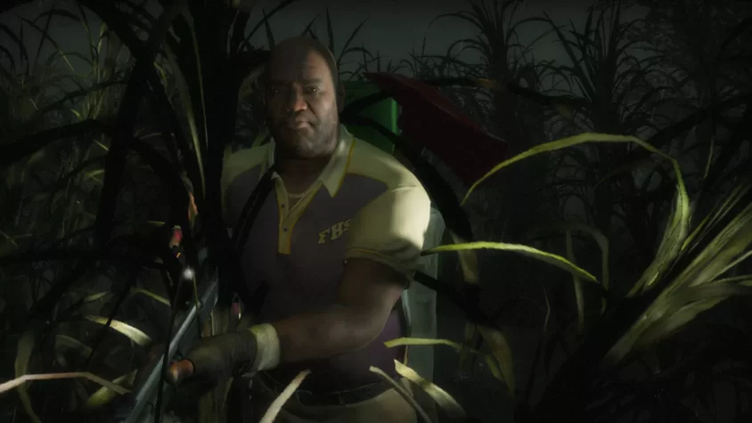 Персонаж игры Left 4 Dead 2 скрывается в кукурузном поле, готовый к встрече с зомби