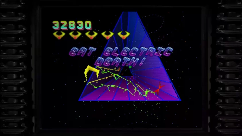 Игровой процесс Tempest 2000 с надписью "EAT ELECTRIC DEATH!"