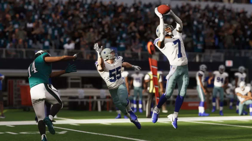 Игрок в Madden NFL 23 в исполнении чудо-приема. Когда ты ловишь мяч и забываешь, что вообще хотел сделать после этого
