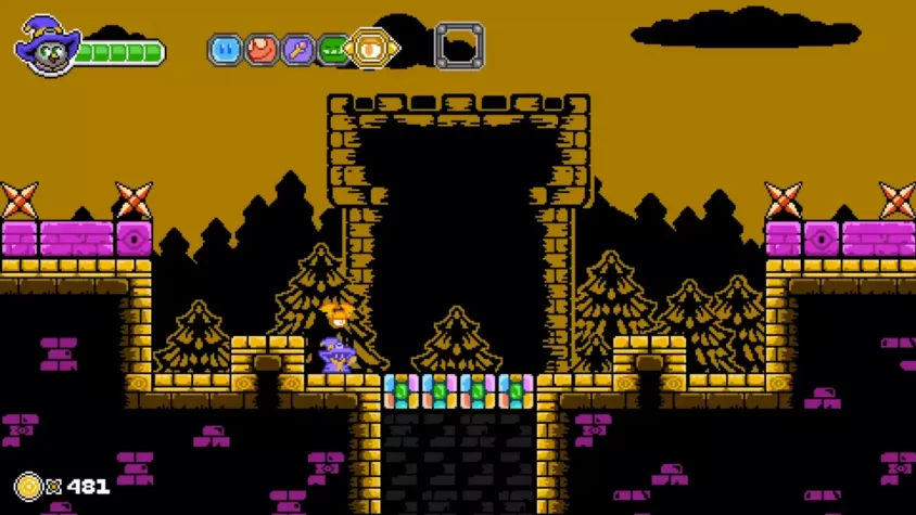 Геймплей игры Ravva and the Phantom Library, лесная зона с разноцветными камнями