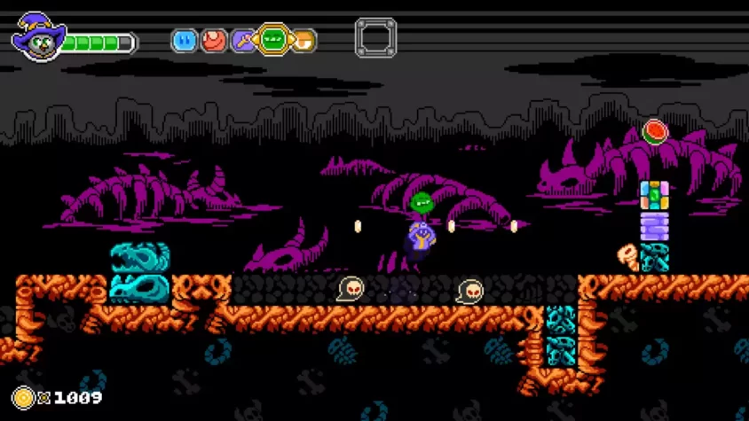 Геймплей игры Ravva and the Phantom Library, пустынная зона с черепами