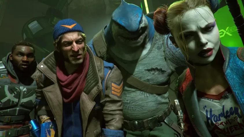 Команда Suicide Squad в боевой готовности, поглядывая на экран с угрозой на горизонте