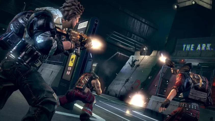 Персонажи из игры Brink в ходе перестрелки в тёмном подземелье, стреляют по врагам
