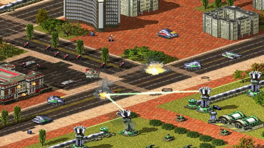 Сцена из Command & Conquer: Red Alert 2 с танками, пехотой и лазерными установками, сражающимися на городских улицах
