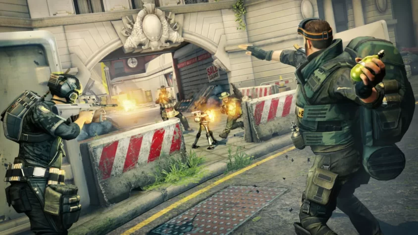 Персонажи в игре Dirty Bomb сражаются у баррикад с применением оружия и гранат