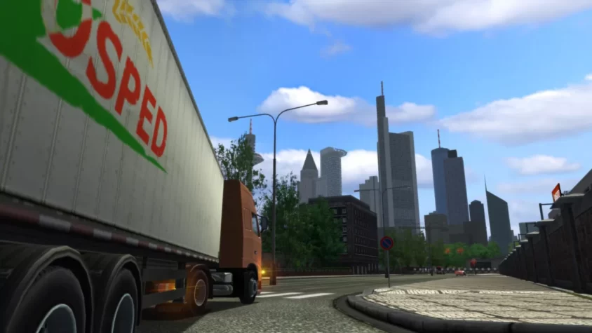 Грузовик на фоне небоскрёбов города в Euro Truck Simulator