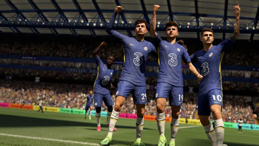 Игроки команды Челси празднуют гол в FIFA 22