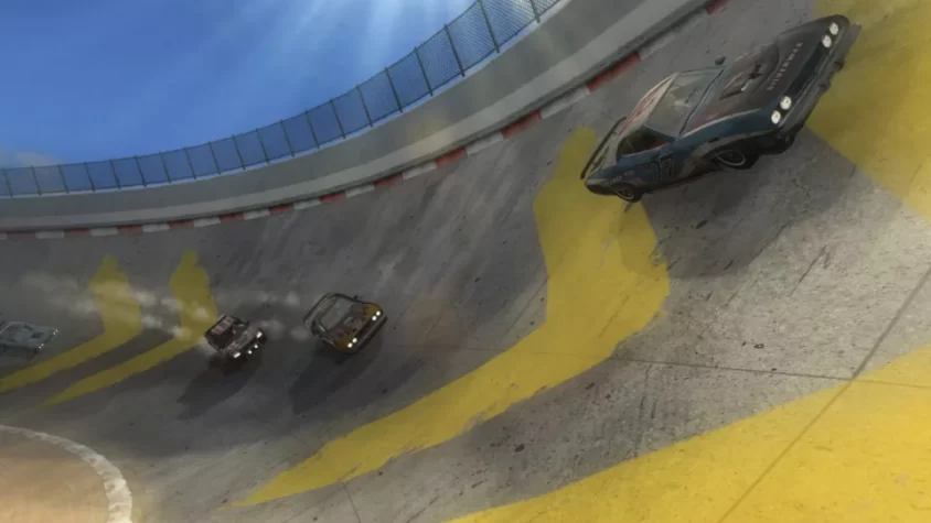 Машины на наклонной трассе в FlatOut 2, где даже гравитация начинает сдаваться