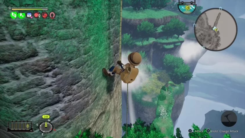 Персонаж, спускающийся по веревке по скале в Made in Abyss: Binary Star Falling into Darkness, с видом на потрясающие пейзажи