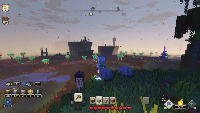 Главный герой Minecraft Legends с компаньоном на фоне заражённого пейзажа и разрушенных построек