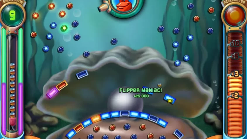 Сцена из Peggle Deluxe с шариками, отскакивающими от платформ