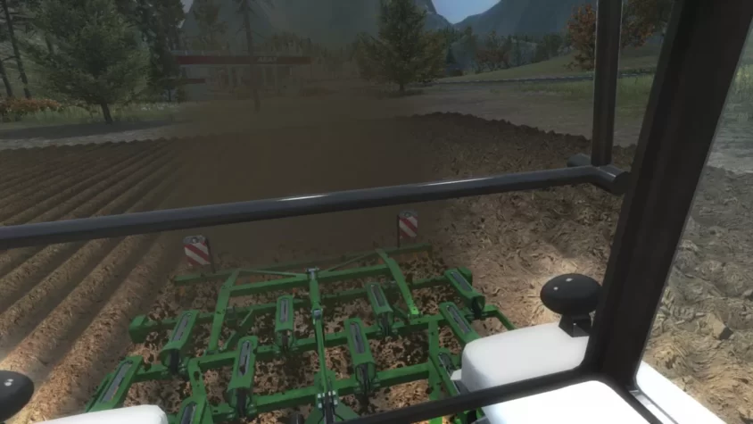 Вид из кабины трактора с культиватором в игре Professional Farmer 2017