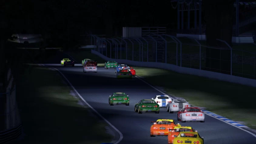 Гоночные автомобили на ночной трассе в игре rFactor
