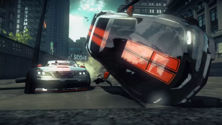 Ridge Racer Unbounded: перевернутая машина на фоне разрушений и огня