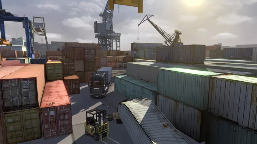 Грузовик Scania среди контейнеров в порту в Scania Truck Driving Simulator