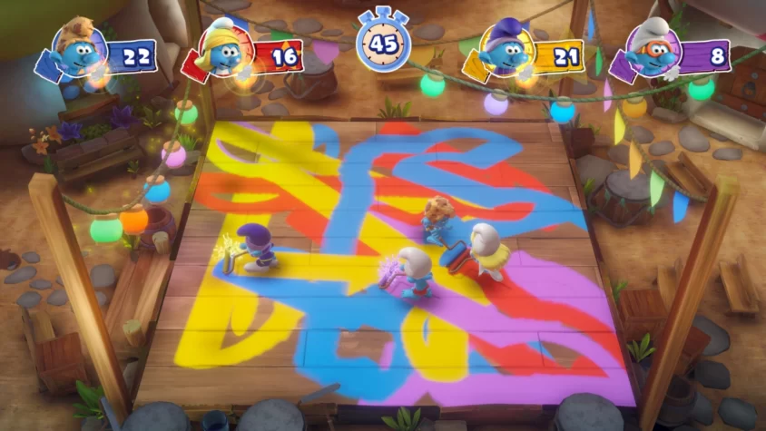 Игровой процесс The Smurfs - Village Party: синие герои красят пол в хаотичном веселье