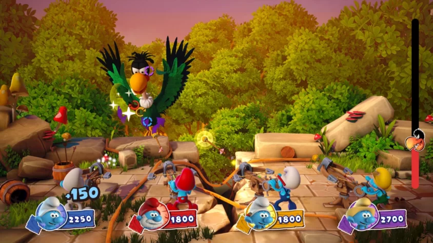 Игровой процесс The Smurfs - Village Party: синие человечки сражаются с птицей, используя катапульты