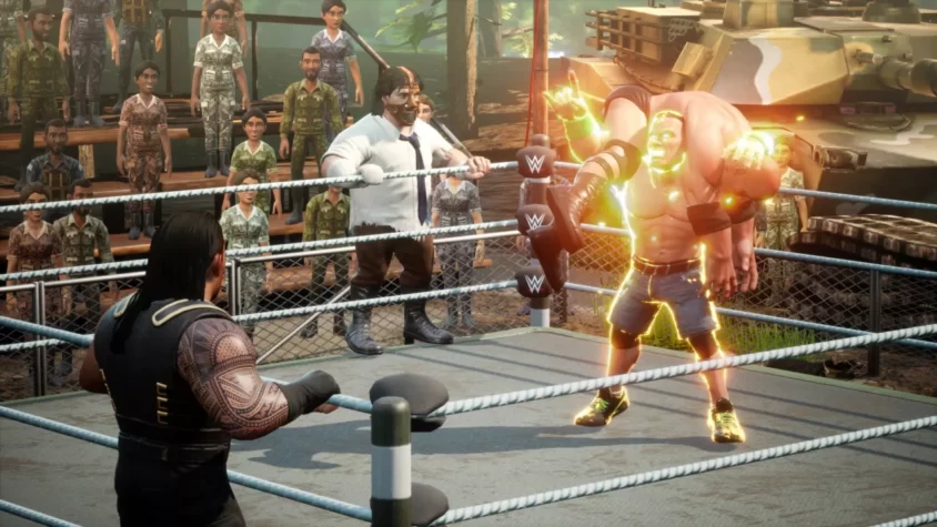Персонажи WWE 2K Battlegrounds в бою на ринге с фанатами в окружении танка и разрушений