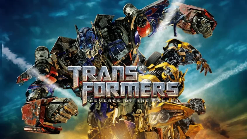 Афиша апокалипсиса в металле Transformers: Revenge of the Fallen Трое трансформеров позируют на фоне взрыва